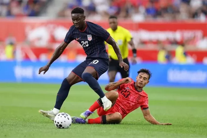 US golden generation lifts W. Cup hopes 12 - Egyptian Gazette