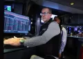Stocks knocked back from record highs as Gulf tensions flare
