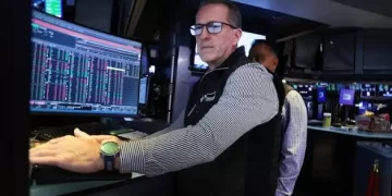Stocks knocked back from record highs as Gulf tensions flare