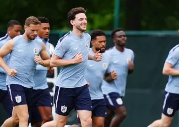 Rice rallies England for W. Cup push