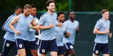 Rice rallies England for W. Cup push