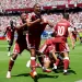 Qatar score late to clinch draw with stunned Switzerland​