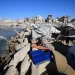 Gazans flee scorching tents for a polluted sea 2 - Egyptian Gazette Gazans flee scorching tents for a polluted sea