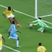 Munoz strike sends Colombia into Round of 32