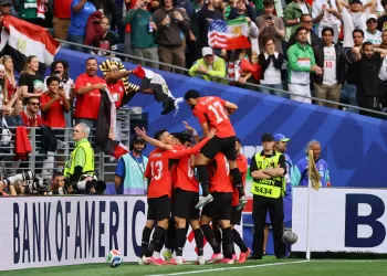 Egypt draws 1-1 with Iran, advances to knockouts