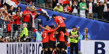 Egypt draws 1-1 with Iran, advances to knockouts