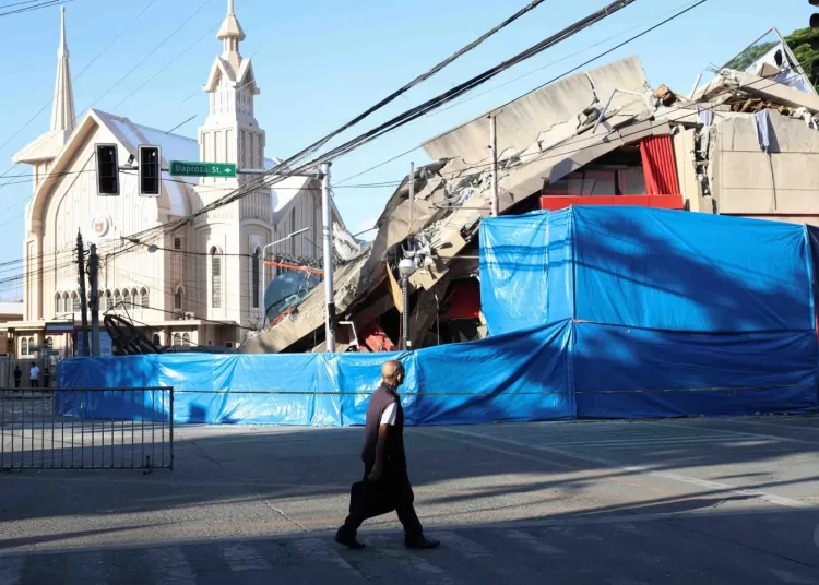 32,000 displaced in devastating Philippines quake 12 - Egyptian Gazette A man walks past a damaged building following an earhtquake in General Santos, Philippines Tuesday, June 9, 2026. (AP Photo/Basilio Sepe)