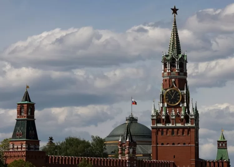 The Russian flag flies on the dome of the Kremlin Senate building behind Spasskaya Tower, in central Moscow, Russia, May 4, 2023. REUTERS/Stringer