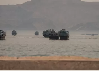 Tanker struck in Hormuz as Iran, US trade attacks in worst escalation
