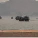 Tanker struck in Hormuz as Iran, US trade attacks in worst escalation