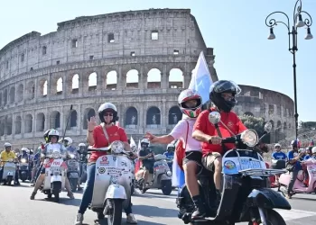 Vespa riders take to roads in Rome to mark 80th birthday