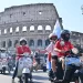 Vespa riders take to roads in Rome to mark 80th birthday
