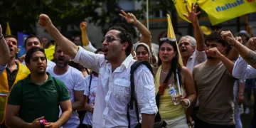 Paris police arrest 20 as demonstrators defy ban on Iran opposition rally