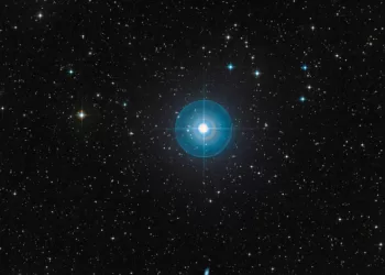 Faint new planet is revealed around a young star after a decade in hiding
