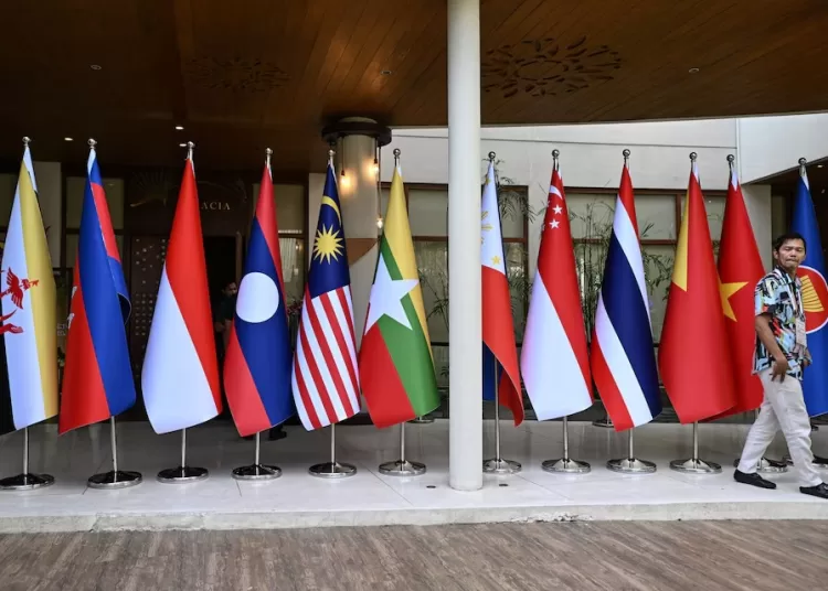 ASEAN diplomats voice serious concern over Middle East hostilities 12 - Egyptian Gazette A man walks past flags of the Association of Southeast Asian Nations (ASEAN) at the International Media Center during the 59th ASEAN Foreign Ministers' Meeting and Related Meetings in Pasay, Metro Manila, Philippines, July 20, 2026.