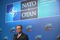 Belgian PM puts the boots in at NATO summit 20 - Egyptian Gazette Belgian PM