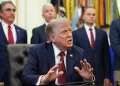 Trump orders military to hold fire in Iran
