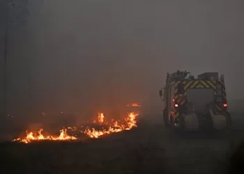 Macron calls crisis meeting as wildfires displace 250,000