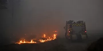Macron calls crisis meeting as wildfires displace 250,000
