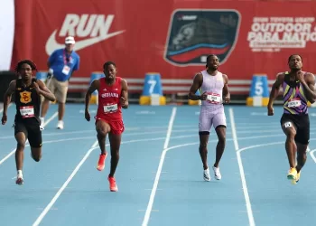 Lyles eases injury fears after 200m