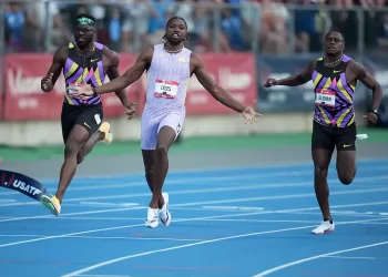 Lyles sprints to US 100m gold