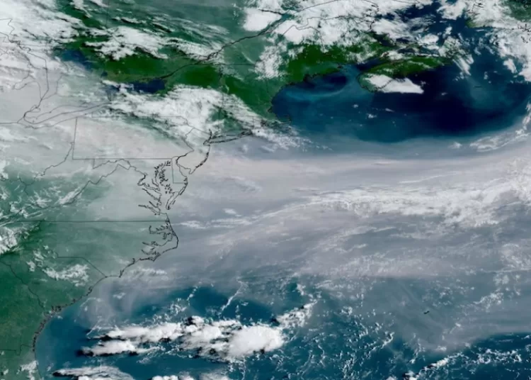 Canada prepares to evacuate Ontario community as wildfire smoke chokes US 13 - Egyptian Gazette Canada prepares to evacuate Ontario community as wildfire smoke chokes US 12 - Egyptian Gazette
