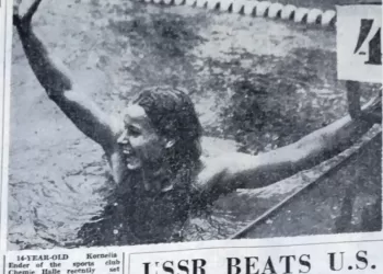 14-year-old swimming prodigy sets two world records