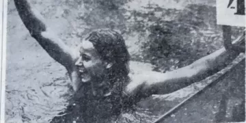 14-year-old swimming prodigy sets two world records
