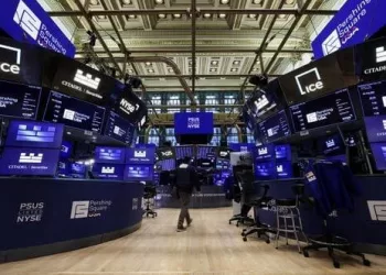 Wall St opens lower as chip rout extends