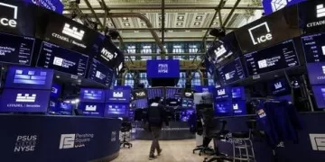 Wall St opens lower as chip rout extends