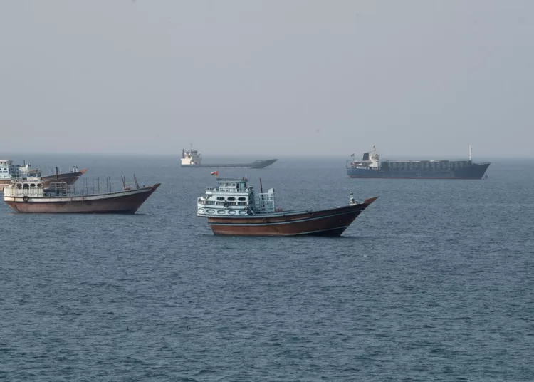 Vessels near the Strait of Hormuz, as seen from Musandam, Oman, August 17, 2026. REUTERS/Stringer