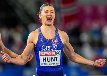 Hunt targets triple gold after 100m win