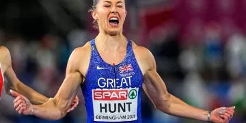 Hunt targets triple gold after 100m win
