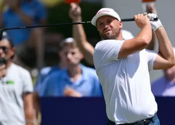 Clark takes charge at BMW tourney