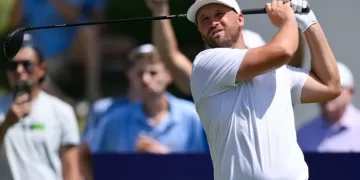 Clark takes charge at BMW tourney