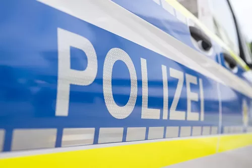 Two dead in Berlin school 'violent incident' 11 - Egyptian Gazette ILLUSTRATION - German Police patrol car parked in front of the Federal Constitutional Court. (is associated with: «Two dead in violent incident at school near Berlin, suspect detained») Uli Deck/dpa