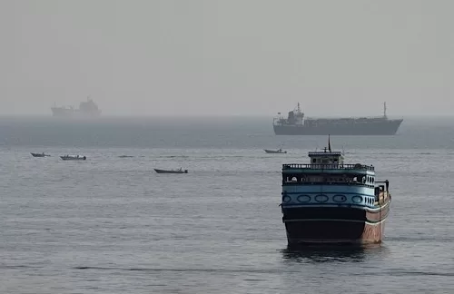 Iran, Oman agree on Hormuz route coordinates 12 - Egyptian Gazette Vessels in the Strait of Hormuz, as seen from Musandam, Oman, August 3, 2026. REUTERS/Stringer