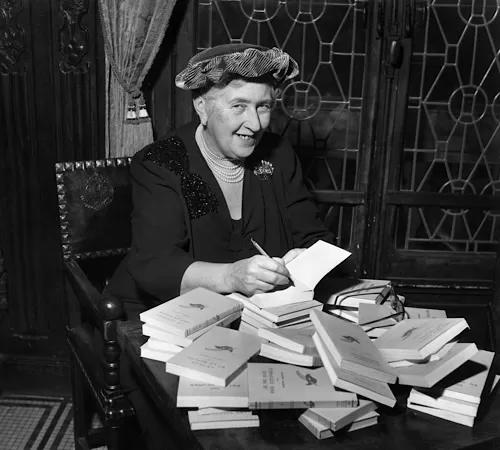 Egypt prepares documentary on Agatha Christie’s Aswan visits 10 - Egyptian Gazette British mystery author Agatha Christie (1890-1976) autographing French editions of her books, circa 1950 / Hulton Archive / Getty Images