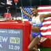 Russell shatters 100m world record