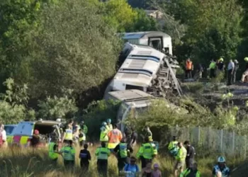 Passenger train derails, flips in southern England