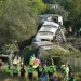 Passenger train derails, flips in southern England