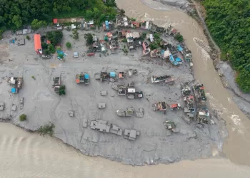 Rescuers race to find missing in Nepal, China floods