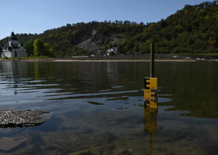 Low Rhine water levels halt some ship sailings 11 - Egyptian Gazette A yellow and black water level gauge is placed near the Kaub gauging station (Kauber Pegelturm) in the Rhine river during prolonged dry weather across Europe that causes massive consequences for German industry, in Kaub, Germany, August 10, 2026.