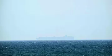 Tanker struck by ‘unknown projectile’ off Oman near Strait of Hormuz