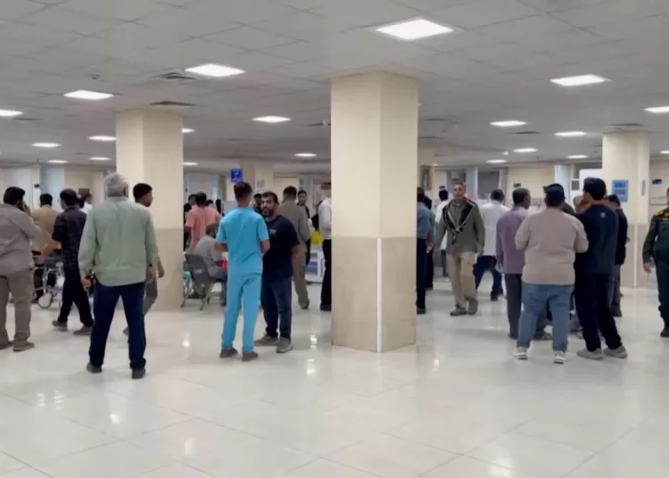 People wait at a hospital lobby following an attack at a wedding near Sirik, a coastal area on the Strait of Hormuz, the Iranian Red Crescent reported, as the United States and Iran engaged in the most significant exchange of fire in weeks, in Sirik, Hormozgan province, Iran, September 2, 2026