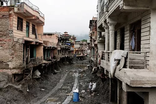 Floods, landslides kill 56 in India, 14 in Nepal 12 - Egyptian Gazette People search for their belongings at a damaged house following deadly flash floods and a mudslide, in Devighat, Nuwakot district, Nepal