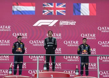 Russell fends off Verstappen to win in Baku