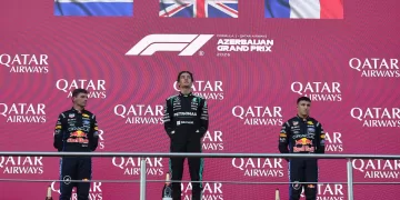 Russell fends off Verstappen to win in Baku