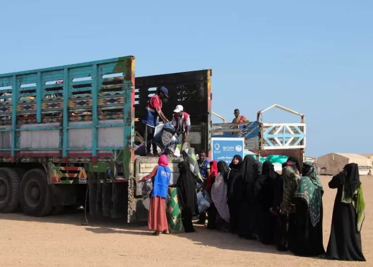 People fleeing clashes between Houthi fighters and Yemeni government forces, queue to receive supplies from the International Organization for Migration at the Markazi refugee camp after arriving in Djibouti, September 18, 2026. REUTERS