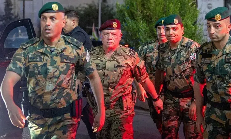 This handout picture released by the Jordanian Royal Palace on October 23, 2026, shows Jordan’s King Abdullah II arriving at Prince Ali Military Hospital in Karak to check on those who were injured in the attack on a Greek Orthodox church in the village of Hammoud in Karak governorate. (Via AFP)